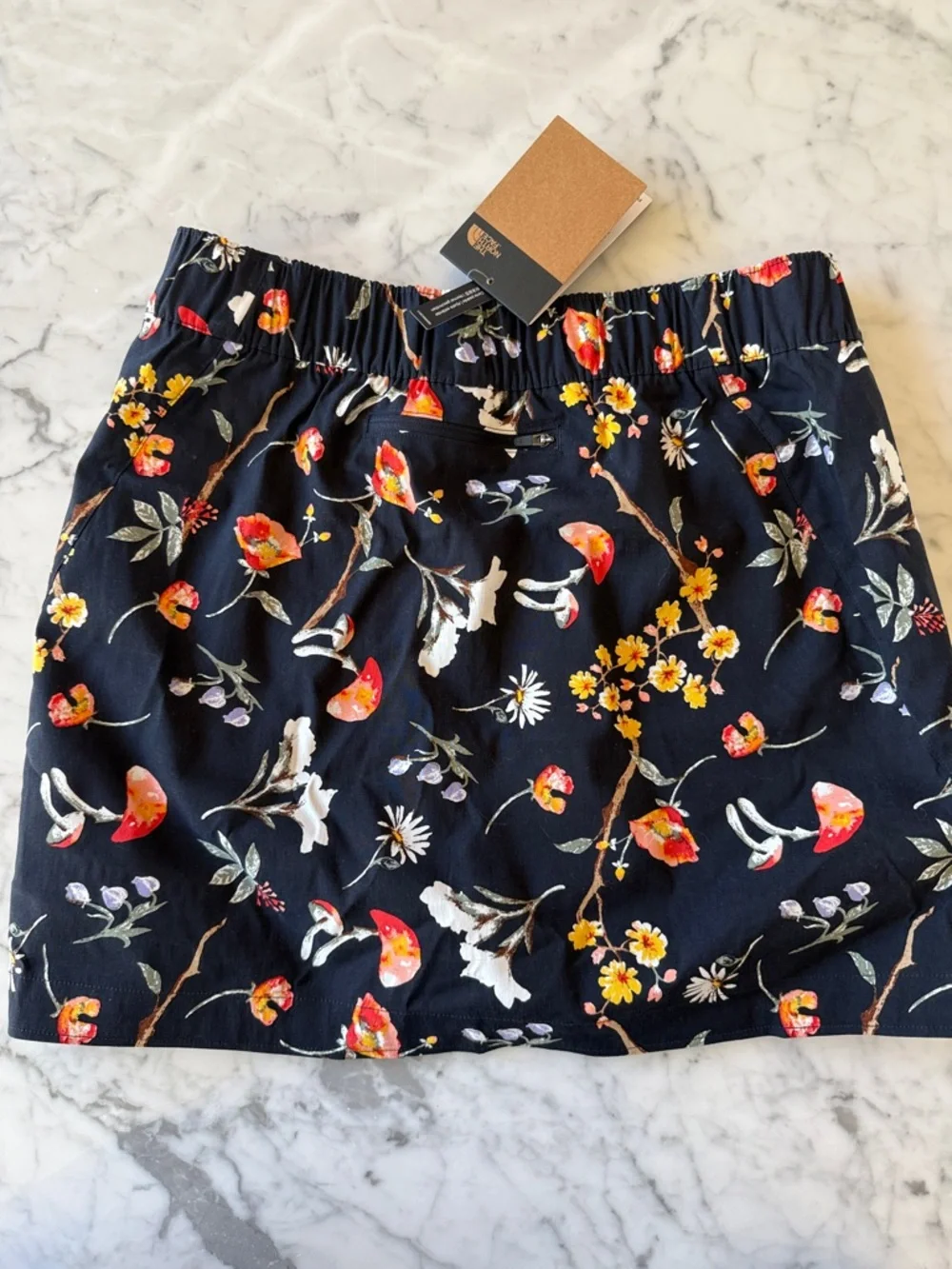 The north face flowers and mushrooms skirt over shorts. Skort NWT. Medium. - Picture 2 of 4
